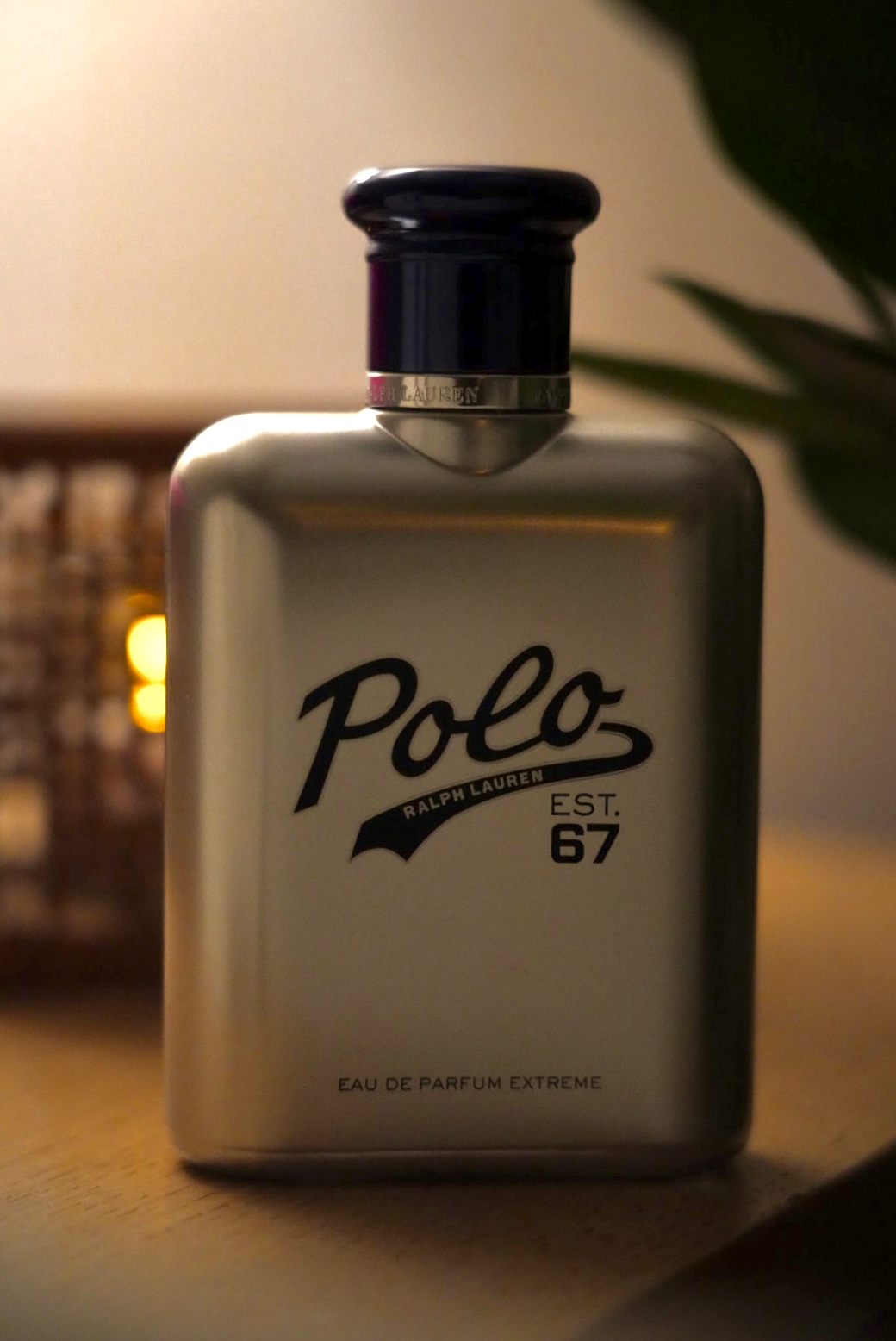 Fragrance bottle glowing in warm amber evening light